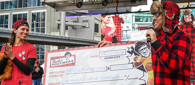 Over $110,000 Raised for Friends of We Care, Caps Off Unparalleled Smoke’s Poutinerie World Poutine Eating Championship