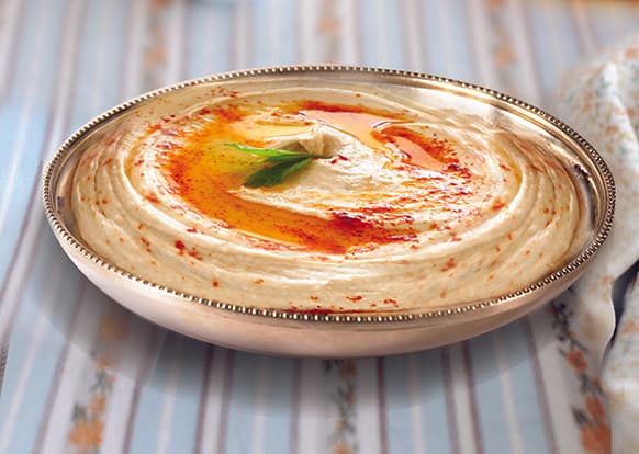Extra Virgin Olive Oil & Chick Pea Hummus. Recipe Courtesy of Iberia