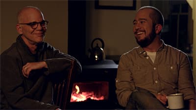 Ralph and Gable behind fire copy