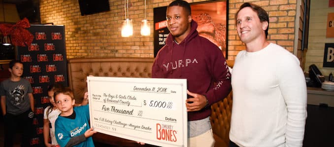 Miami Dolphins Running Back Kenyan Drake’s Attempt to Devour Five Pounds of Smokey Bones’ Bigger & Better Signature Dishes for Charity