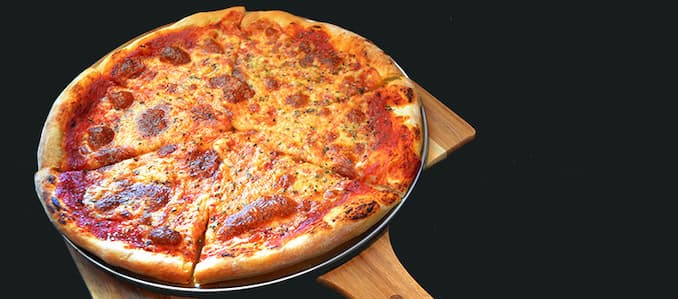 Kenny Bowers Challenges Diners To Take The Bad Bing Challenge At Kenny’s East Coast Pizza