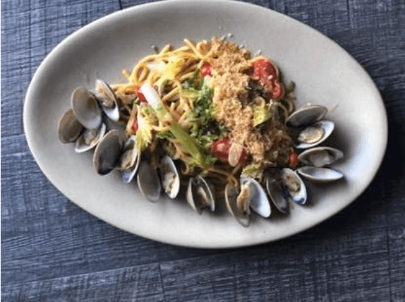 Macchialina’s Chef Michael Pirolo’s recipe for Spaghetti con Vongole and a classic martini, both made with Noilly Prat – the original French vermouth.