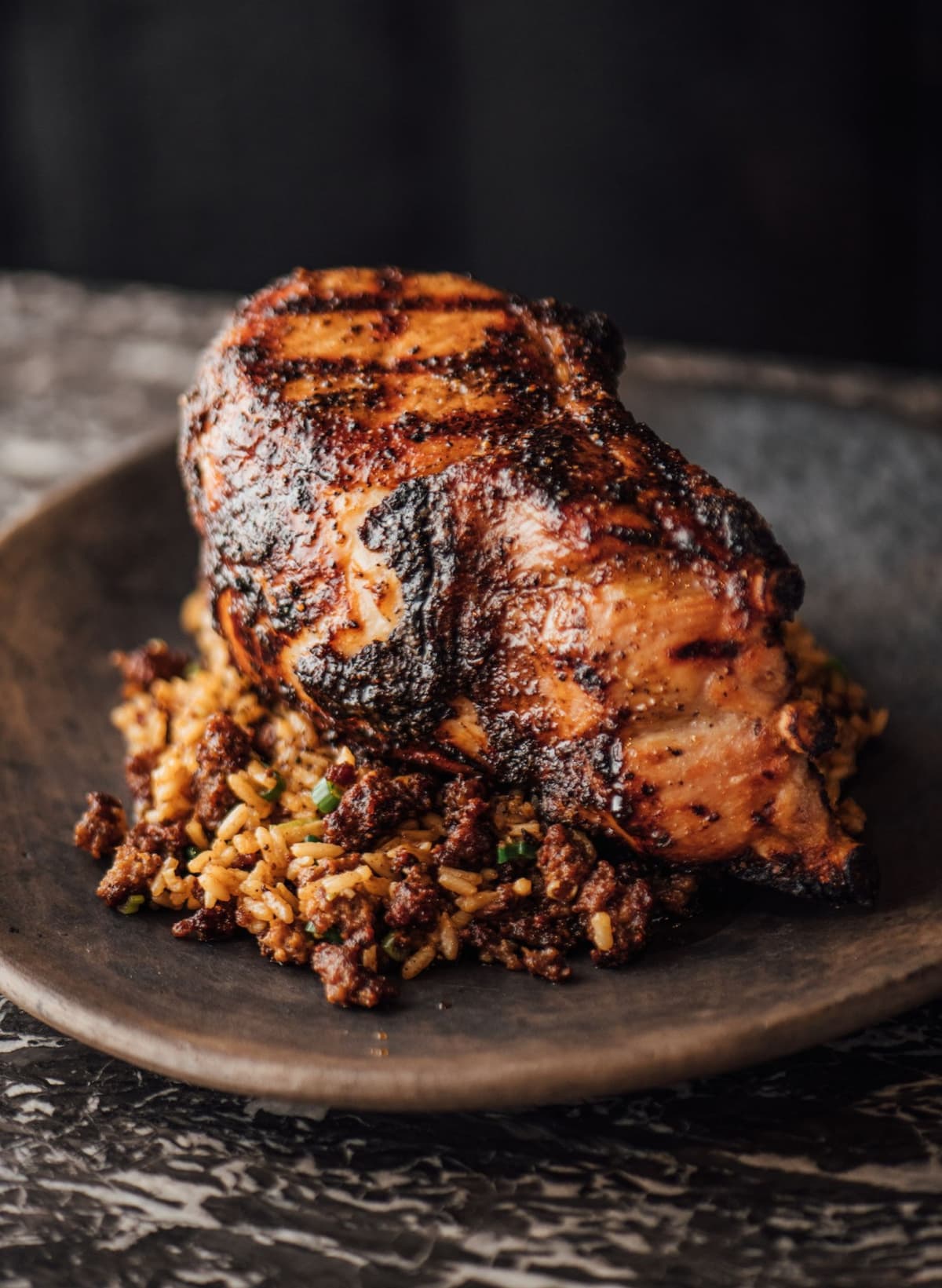 GRILLED DOUBLE-CUT PORK CHOP WITH CANE SYRUP GASTRIQUE