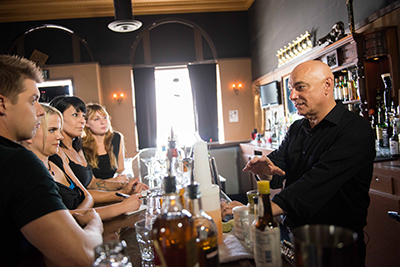 John Green behind the bar