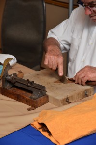 Cigar Boutique of Little Havana rolling cigars at the Heritage Neighborhood Showcase