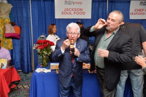 GMCVB's President and CEO Bill Talbert and Bureau Chairman Steve Haas enjoy Jackson Soul Food delicious offerings at Iron Fork's Heritage Neighborhood Showcase 2