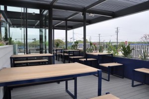 BACKBEAT TOASTS TO DEBUT ON SOUTH LAMAR roof patio
