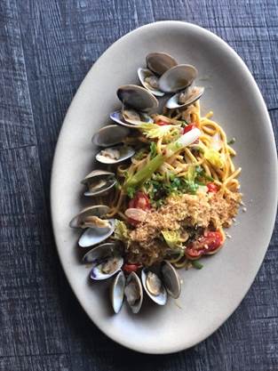 Macchialina’s Chef Michael Pirolo’s recipe for Spaghetti con Vongole and a classic martini, both made with Noilly Prat – the original French vermouth.