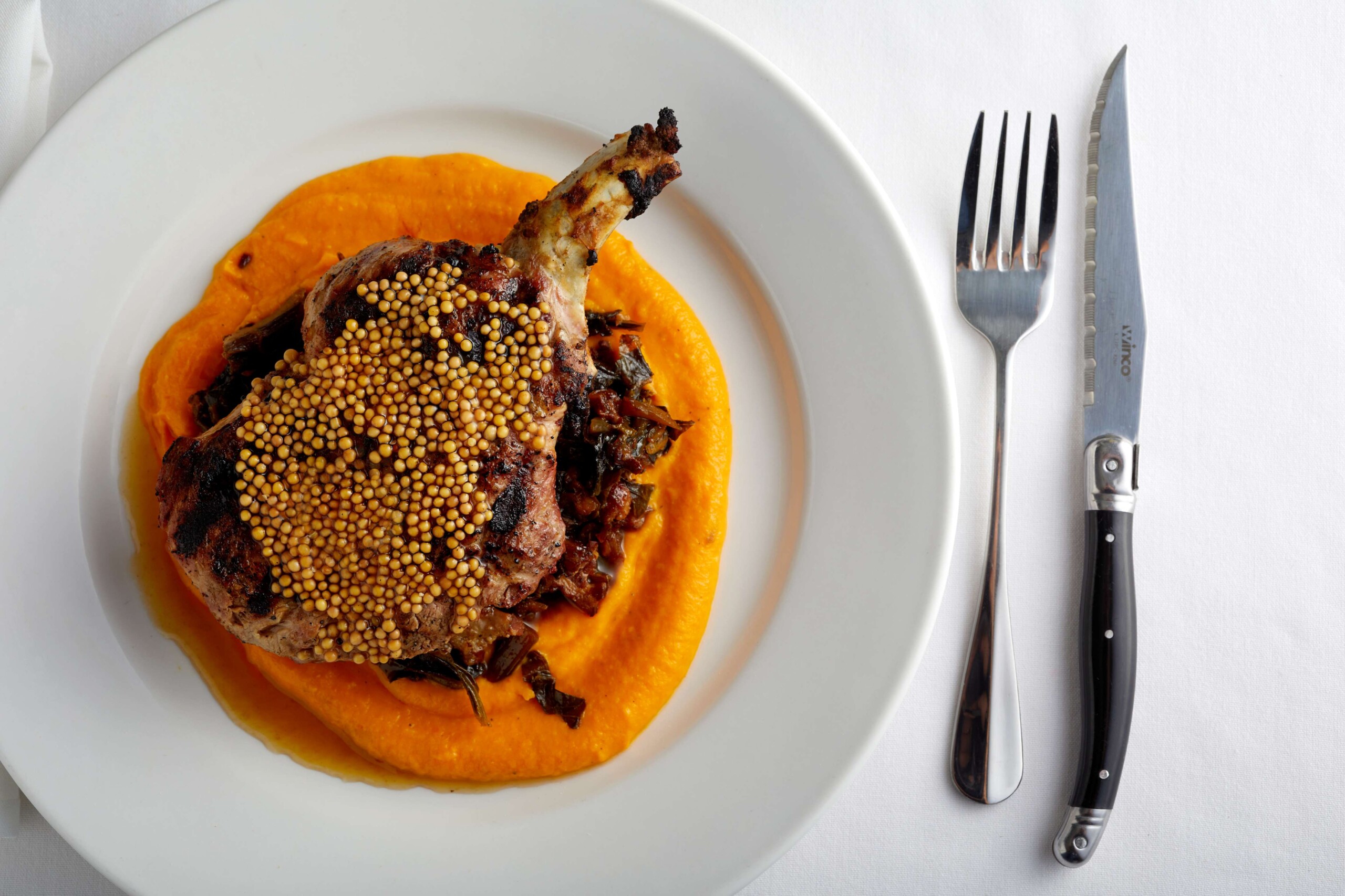 Tujague's Pork Chop Photo Credit Sam Hanna