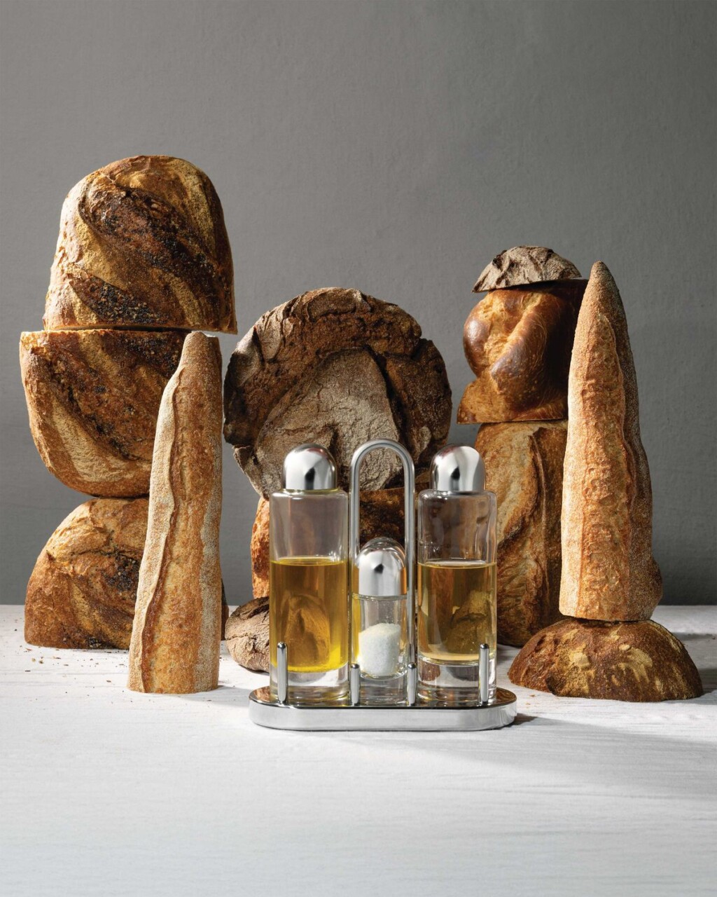 5051_Ice bucket with handles and grating in 1810 stainless steel_design_Ettore Sottsass_1979